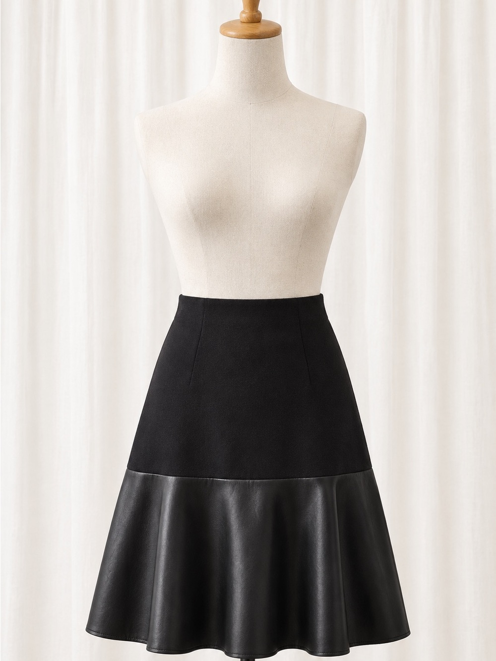 CAbi Black A-Line Skirt with Faux Leather Flared Hem